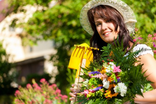 Pruning shrubs in an Aldgate garden