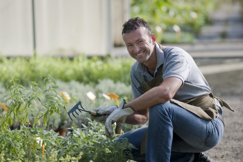Experienced garden clearance team working on a residential garden in Aldgate